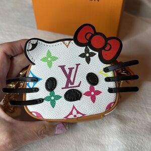 Hello kitty mini bag original LV material